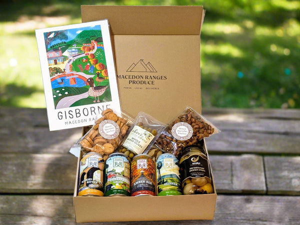 looking inside a gift hamper of Rock and Ranges beers and snacks from The Macedon Ranges