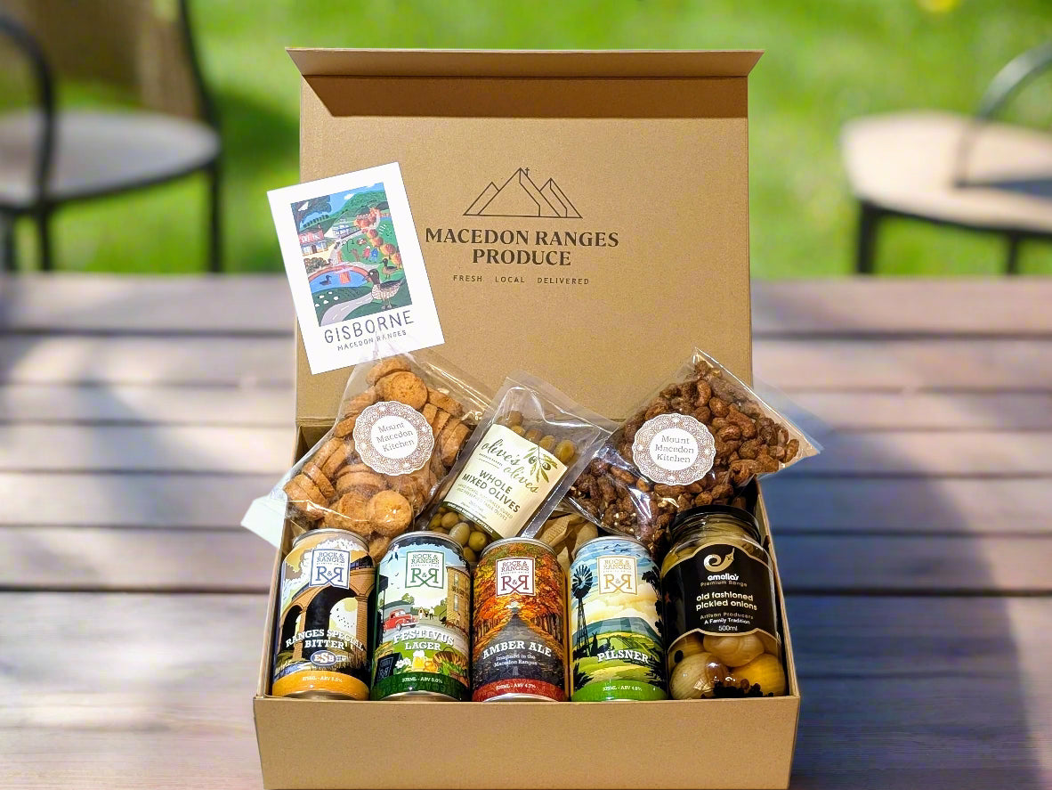 looking inside a gift hamper of Rock and Ranges beers and snacks from The Macedon Ranges