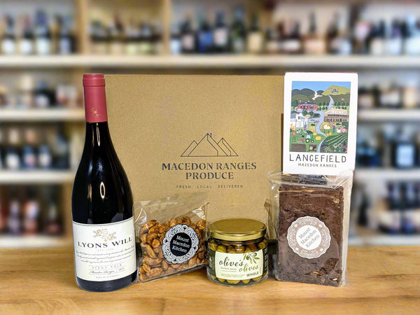 Gift set with a bottle of Lyon's Will Pinot Noir, snacks, and a card from the Macedon Ranges