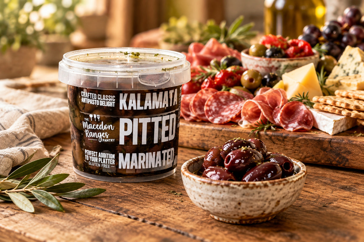 a tub of marinated kalamata pitted olives from The Macedon Ranges Pantry in the Macedon Ranges. 