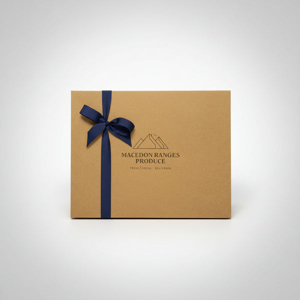 A Macedon Ranges Produce Gift Hamper Box with Ribbon.