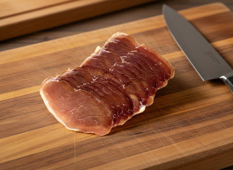 Thinly slice Pecenica from Istra Smallgoods in the Macedon Ranges