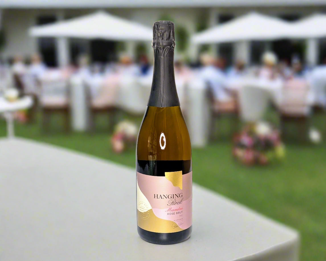 a bottle of brut rose on a table at the races in Macedon Ranges