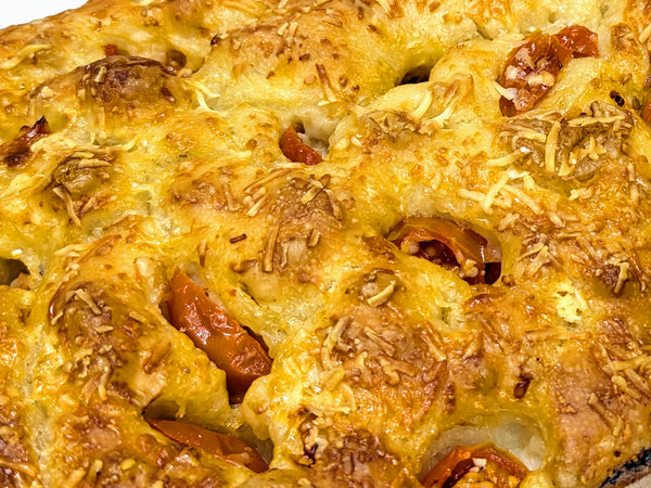 close up of a cheese and tomato focaccia from Beau Baker in The Macedon Ranges