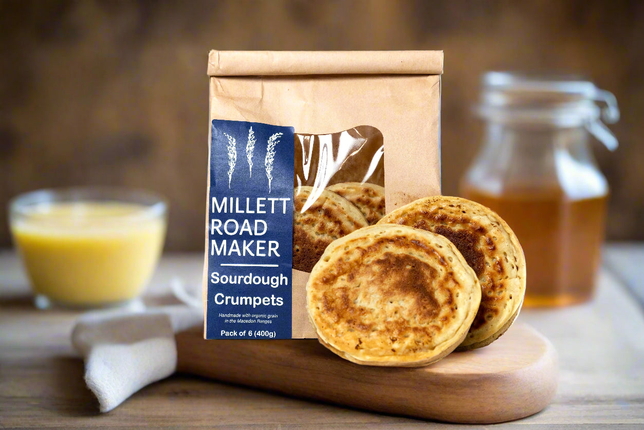 sourdough crumpets from the Macedon Ranges on breakfast bench with butter and honey