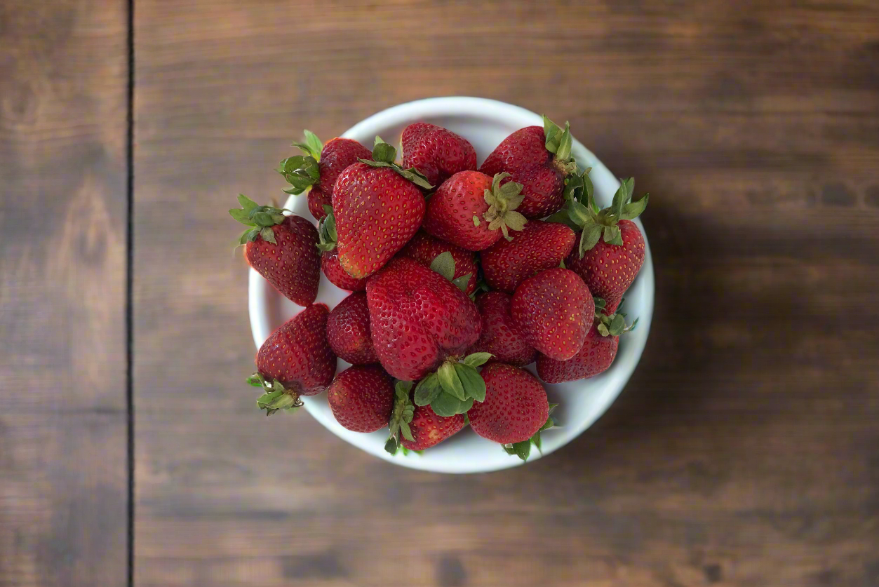 a bowl of fresh strawberries picked in The Macedon Ranges