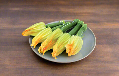 Zucchini flowers from the Macedon Ranges on a plate on a table